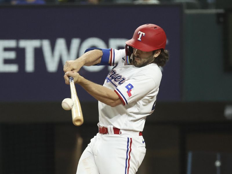 Jun 28, 2023; Arlington, Texas, USA;  Texas Rangers shortstop Josh Smith (47) hits an rbi single during the seventh inning against the Detroit Tigers at Globe Life Field. Mandatory Credit: Kevin Jairaj-USA TODAY Sports