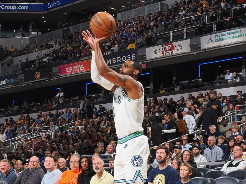 INDIANAPOLIS, IN - MARCH 7: Mike Conley #10 of the Minnesota Timberwolves shoots a three point basket during the game against the Indiana Pacers on March 7, 2024 at Gainbridge Fieldhouse in Indianapolis, Indiana. NOTE TO USER: User expressly acknowledges and agrees that, by downloading and or using this Photograph, user is consenting to the terms and conditions of the Getty Images License Agreement. Mandatory Copyright Notice: Copyright 2024 NBAE (Photo by Ron Hoskins/NBAE via Getty Images)