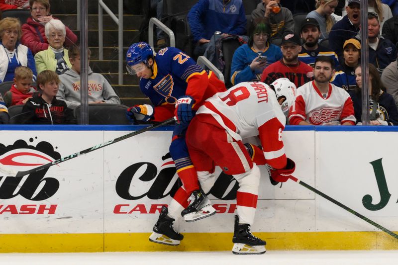 Apr 1, 2025; St. Louis, Missouri, USA; Detroit Red Wings defenseman Ben Chiarot (8) checks St. Louis Blues center Jordan Kyrou (25) during the second period at Enterprise Center. Mandatory Credit: Jeff Le-Imagn Images