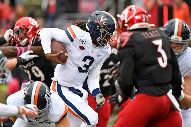 Oct 26, 2019; Louisville, KY, USA; Virginia Cavaliers quarterback Bryce Perkins (3) runs the ball against the Louisville Cardinals during the first quarter of play at Cardinal Stadium. Mandatory Credit: Jamie Rhodes-USA TODAY Sports