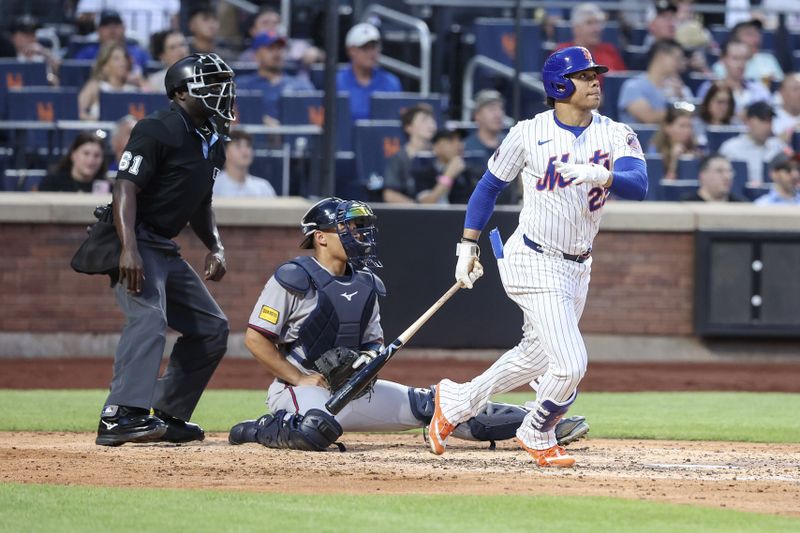 Jun 25, 2025; New York City, New York, USA;  New York Mets right fielder Juan Soto (22) hits a solo home run in the fourth inning against the Atlanta Braves at Citi Field. Mandatory Credit: Wendell Cruz-Imagn Images
