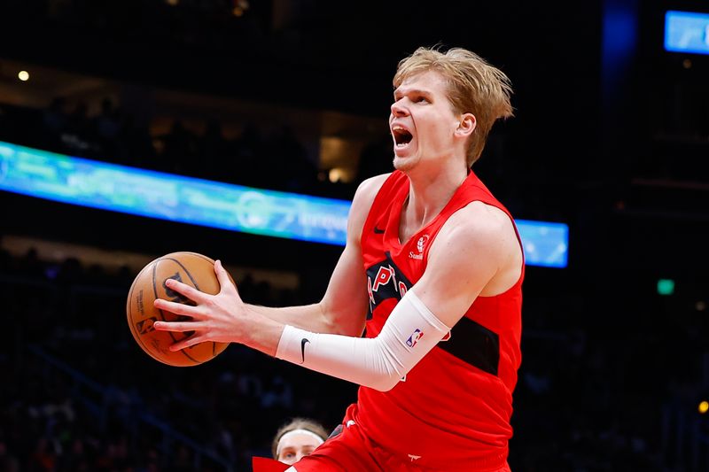 ATLANTA, GEORGIA - FEBRUARY 23: Gradey Dick #1 of the Toronto Raptors drives to the basket during the third quarter against the Atlanta Hawks at State Farm Arena on February 23, 2024 in Atlanta, Georgia. NOTE TO USER: User expressly acknowledges and agrees that, by downloading and or using this photograph, User is consenting to the terms and conditions of the Getty Images License Agreement. (Photo by Todd Kirkland/Getty Images)