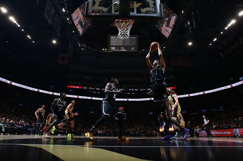 TORONTO, CANADA - FEBRUARY 22: Mikal Bridges #1 of the Brooklyn Nets grabs the rebound during the game against the Toronto Raptors on February 22, 2024 at the Scotiabank Arena in Toronto, Ontario, Canada.  NOTE TO USER: User expressly acknowledges and agrees that, by downloading and or using this Photograph, user is consenting to the terms and conditions of the Getty Images License Agreement.  Mandatory Copyright Notice: Copyright 2024 NBAE (Photo by Vaughn Ridley/NBAE via Getty Images)