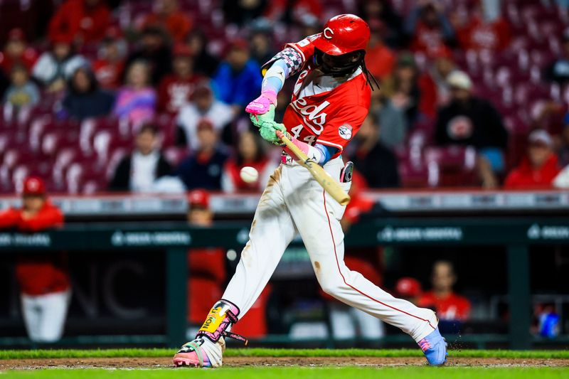 May 3, 2025; Cincinnati, Ohio, USA; Cincinnati Reds shortstop Elly De La Cruz (44) hits a RBI double in the ninth inning against the Washington Nationals at Great American Ball Park. Mandatory Credit: Katie Stratman-Imagn Images