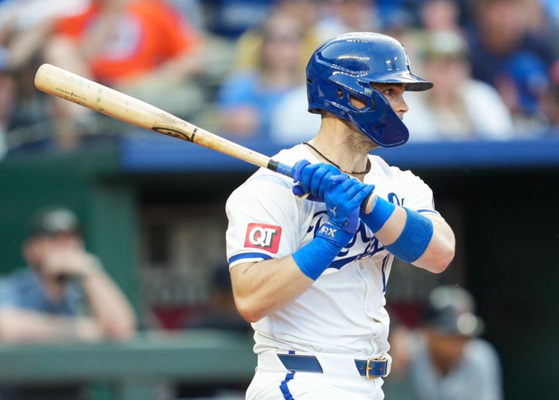 May 20, 2024; Kansas City, Missouri, USA; Kansas City Royals second baseman Michael Massey (19) hits a single during the third inning against the Detroit Tigers at Kauffman Stadium. Mandatory Credit: Jay Biggerstaff-USA TODAY Sports