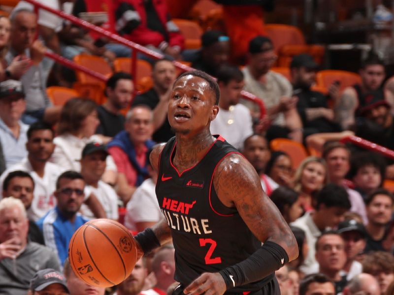 MIAMI, FL - APRIL 4: Terry Rozier #2 of the Miami Heat brings the ball up court during the game against the Philadelphia 76ers on April 4, 2024 at Kaseya Center in Miami, Florida. NOTE TO USER: User expressly acknowledges and agrees that, by downloading and or using this Photograph, user is consenting to the terms and conditions of the Getty Images License Agreement. Mandatory Copyright Notice: Copyright 2024 NBAE (Photo by Issac Baldizon/NBAE via Getty Images)