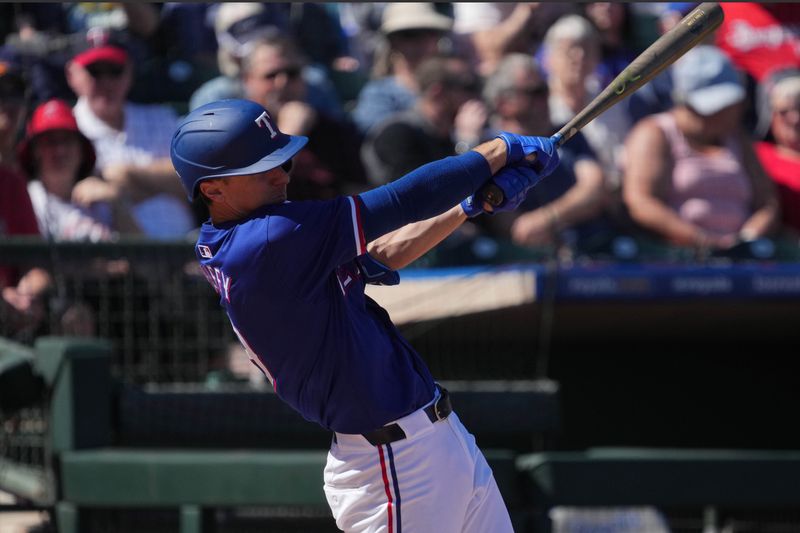 Mar 4, 2024; Surprise, Arizona, USA; Texas Rangers third baseman Matt Duffy (9) bats against the Los Angeles Angels during the second inning at Surprise Stadium. Mandatory Credit: Joe Camporeale-USA TODAY Sports