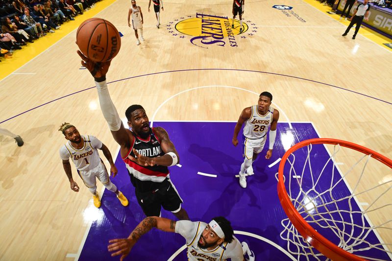 LOS ANGELES, CA - DECEMBER 8: Deandre Ayton #2 of the Portland Trail Blazers drives to the basket during the game against the Los Angeles Lakers on December 8, 2024 at Crypto.Com Arena in Los Angeles, California. NOTE TO USER: User expressly acknowledges and agrees that, by downloading and/or using this Photograph, user is consenting to the terms and conditions of the Getty Images License Agreement. Mandatory Copyright Notice: Copyright 2024 NBAE (Photo by Adam Pantozzi/NBAE via Getty Images)