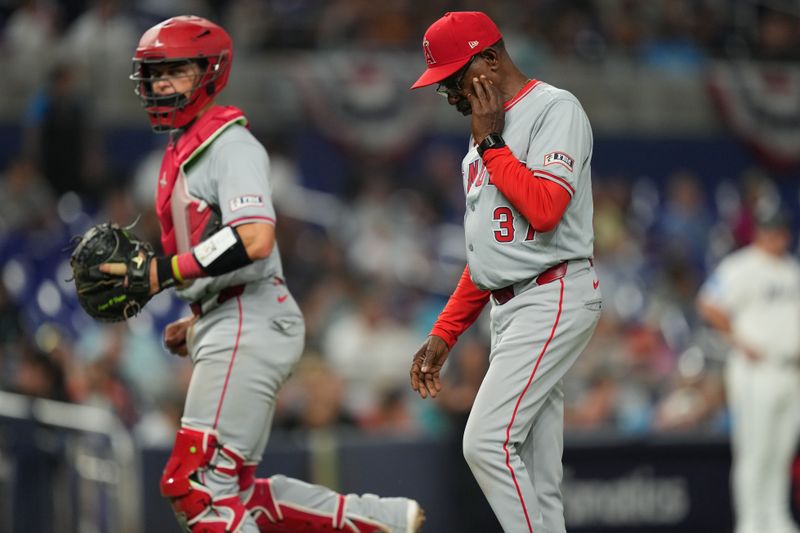Apr 2, 2024; Miami, Florida, USA; Los Angeles Angels manager Ron Washington (37) visits the mound in the ninth inning against the Miami Marlins at loan Depot Park. Mandatory Credit: Jim Rassol-USA TODAY Sports