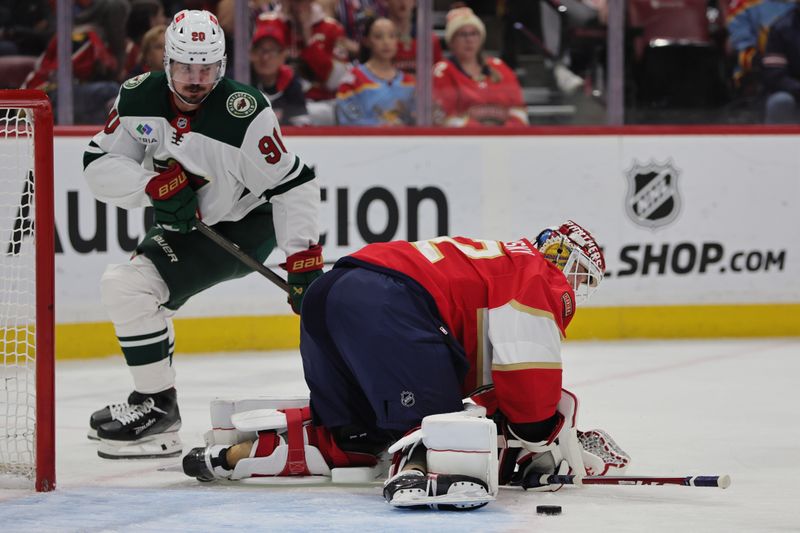 Oct 22, 2024; Sunrise, Florida, USA; Florida Panthers goaltender Sergei Bobrovsky (72) makes a save against Minnesota Wild center Marcus Johansson (90) during the first period at Amerant Bank Arena. Mandatory Credit: Sam Navarro-Imagn Images