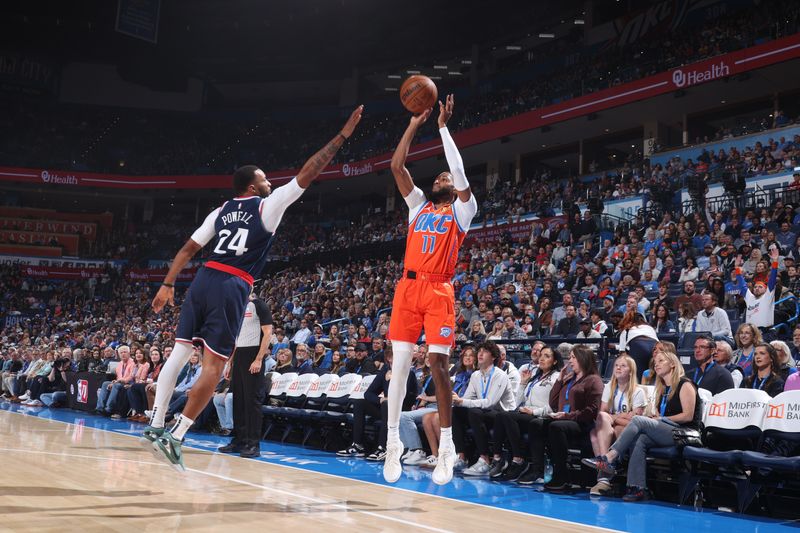 OKLAHOMA CITY, OK - NOVEMBER 11: Isaiah Joe #11 of the Oklahoma City Thunder shoots a three point basket during the game against the LA Clippers on November 11, 2024 at Paycom Center in Oklahoma City, Oklahoma. NOTE TO USER: User expressly acknowledges and agrees that, by downloading and or using this photograph, User is consenting to the terms and conditions of the Getty Images License Agreement. Mandatory Copyright Notice: Copyright 2024 NBAE (Photo by Nathaniel S. Butler/NBAE via Getty Images)
