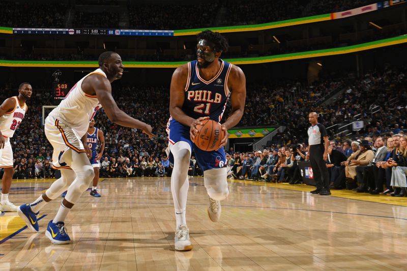 SAN FRANCISCO, CA - JANUARY 2:  Joel Embiid #21 of the Philadelphia 76ers shoots the ball during the game against the Golden State Warriorson January 2, 2025 at Chase Center in San Francisco, California. NOTE TO USER: User expressly acknowledges and agrees that, by downloading and or using this photograph, user is consenting to the terms and conditions of Getty Images License Agreement. Mandatory Copyright Notice: Copyright 2025 NBAE (Photo by Noah Graham/NBAE via Getty Images)