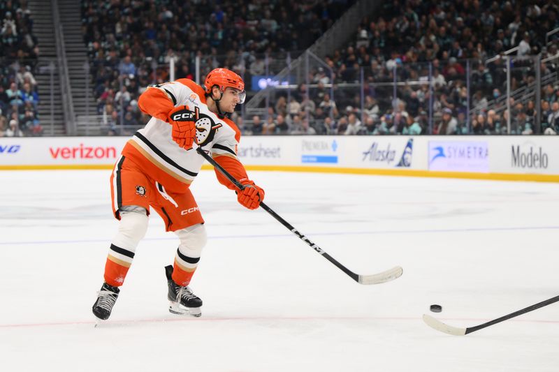 Nov 27, 2024; Seattle, Washington, USA; Anaheim Ducks left wing Cutter Gauthier (61) shoots and scores a goal against the Seattle Kraken during the second period at Climate Pledge Arena. Mandatory Credit: Steven Bisig-Imagn Images