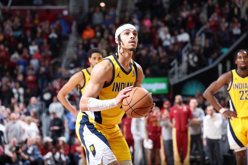 CLEVELAND, OH - APRIL 12: Andrew Nembhard #2 of the Indiana Pacers shoots a free throw during the game against the Cleveland Cavaliers on April 12, 2024 at Rocket Mortgage FieldHouse in Cleveland, Ohio. NOTE TO USER: User expressly acknowledges and agrees that, by downloading and/or using this Photograph, user is consenting to the terms and conditions of the Getty Images License Agreement. Mandatory Copyright Notice: Copyright 2024 NBAE (Photo by Jeff Haynes/NBAE via Getty Images)