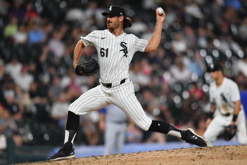 Jul 30, 2024; Chicago, Illinois, USA; Chicago White Sox relief pitcher Fraser Ellard (61) pitches during the eighth inning against the Kansas City Royals at Guaranteed Rate Field. Mandatory Credit: Patrick Gorski-USA TODAY Sports