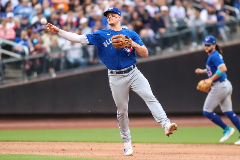 Jun 3, 2023; New York City, New York, USA;  Toronto Blue Jays third baseman Matt Chapman (36) makes an off-balance throw to first in the fifth inning against the New York Mets at Citi Field. Mandatory Credit: Wendell Cruz-USA TODAY Sports