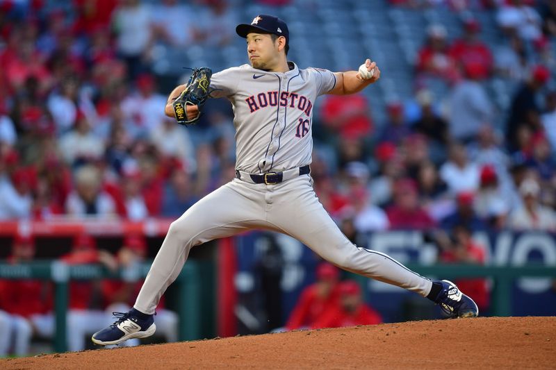 Sep 13, 2024; Anaheim, California, USA; Houston Astros pitcher Yusei Kikuchi (16) throws against the Los Angeles Angels during the first inning at Angel Stadium. Mandatory Credit: Gary A. Vasquez-Imagn Images