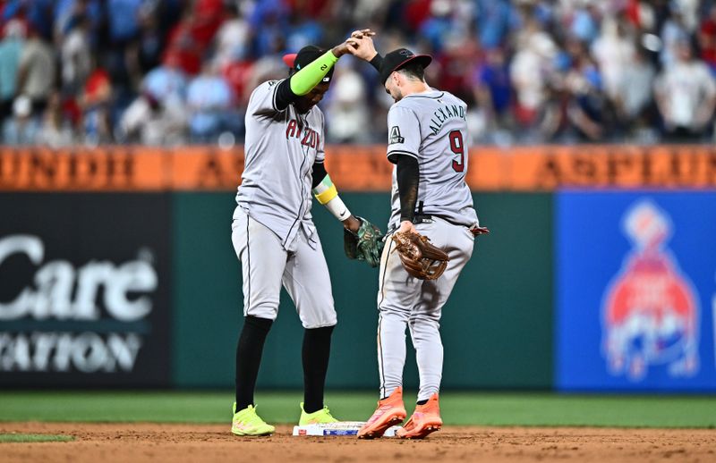 Jun 21, 2024; Philadelphia, Pennsylvania, USA; Arizona Diamondbacks infielder Geraldo Perdomo (2) celebrates with infielder Blaze Alexander (9) after the game against the Philadelphia Phillies at Citizens Bank Park. Mandatory Credit: Kyle Ross-USA TODAY Sports