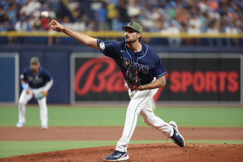 May 20, 2023; St. Petersburg, Florida, USA;  Tampa Bay Rays starting pitcher Zach Eflin (24) throws a  pitch during the second inning against the Milwaukee Brewers at Tropicana Field. Mandatory Credit: Kim Klement-USA TODAY Sports