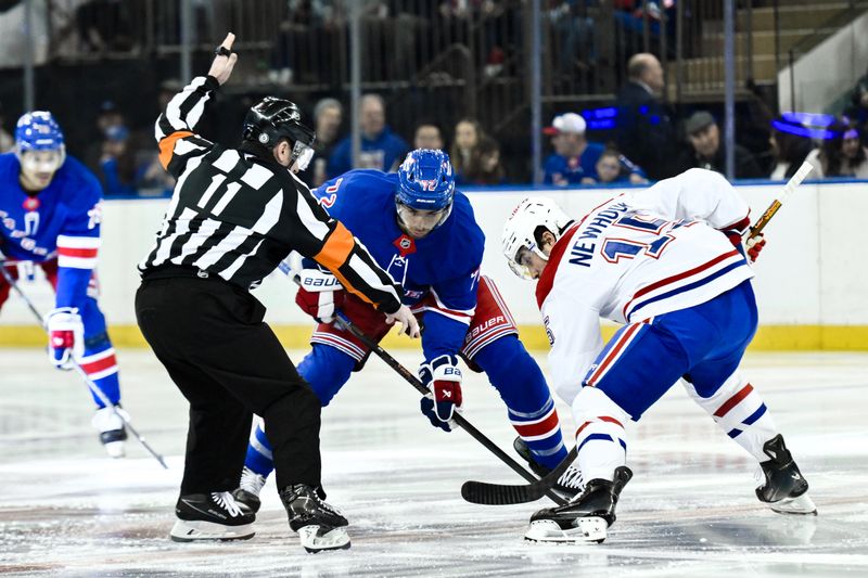 Nov 30, 2024; New York, New York, USA; New York Rangers center Filip Chytil (72) faces off against Montreal Canadiens center Alex Newhook (15) during the first period at Madison Square Garden. Mandatory Credit: John Jones-Imagn Images