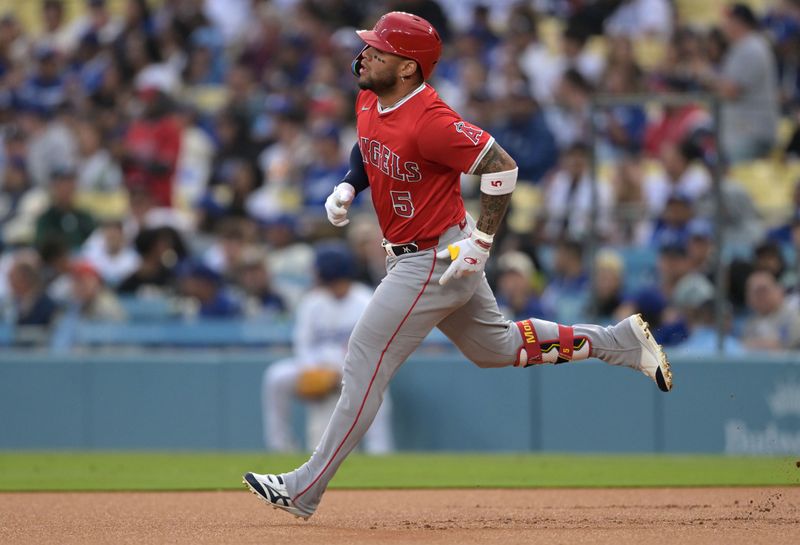 May 16, 2025; Los Angeles, California, USA; Los Angeles Angels third baseman Yoan Moncada (5) runs the bases after a two-run home run during the first inning against the Los Angeles Dodgers at Dodger Stadium. Mandatory Credit: Jayne Kamin-Oncea-Imagn Images
