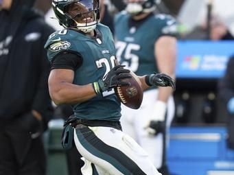 Philadelphia Eagles running back Saquon Barkley (26) reacts to being ruled down during the NFL football game against the Carolina Panthers, Sunday, Dec. 8, 2024, in Philadelphia. Saquon Barkley sets the Philadelphia Eagles single season rushing record on this run.The Eagles won 22-16. (AP Photo/Chris Szagola)