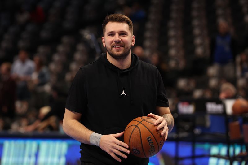 OKLAHOMA CITY, OK - DECEMBER 3: Luka Doncic #77 of the Dallas Mavericks of the Dallas Mavericks warms up before the game against the Memphis Grizzlies during the Emirates NBA Cup game on on December 3, 2024 at Paycom Center in Oklahoma City, Oklahoma. NOTE TO USER: User expressly acknowledges and agrees that, by downloading and or using this photograph, User is consenting to the terms and conditions of the Getty Images License Agreement. Mandatory Copyright Notice: Copyright 2024 NBAE (Photo by Zach Beeker/NBAE via Getty Images)