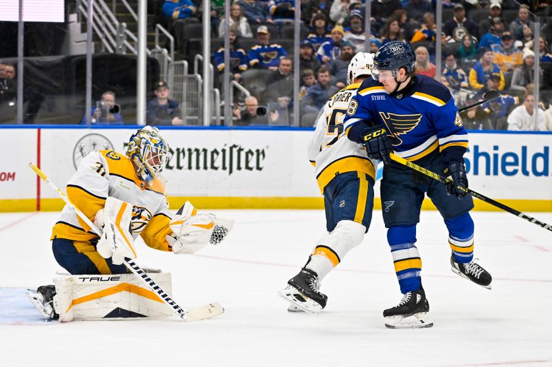 Nov 24, 2023; St. Louis, Missouri, USA;  Nashville Predators goaltender Kevin Lankinen (32) defends the net against the St. Louis Blues during the second period at Enterprise Center. Mandatory Credit: Jeff Curry-USA TODAY Sports