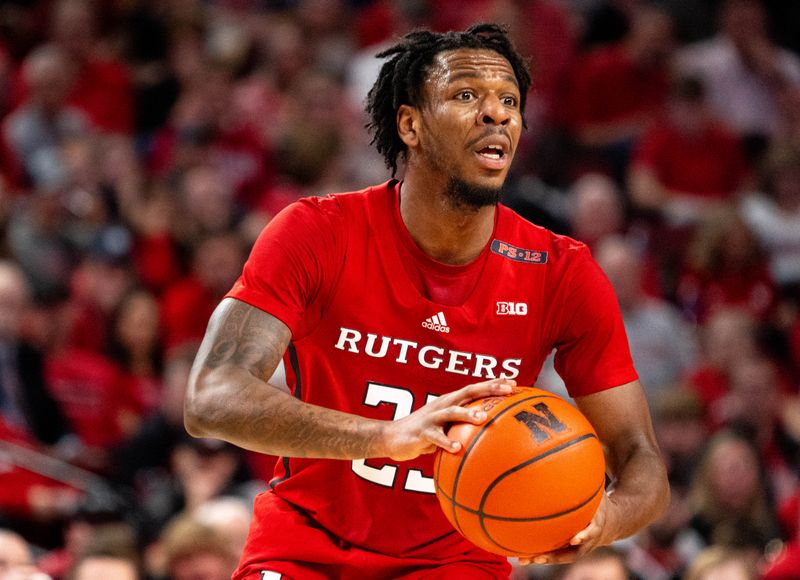 Mar 3, 2024; Lincoln, Nebraska, USA; Rutgers Scarlet Knights guard Jeremiah Williams (25) looks to pass against the Nebraska Cornhuskers during the second half at Pinnacle Bank Arena. Mandatory Credit: Dylan Widger-USA TODAY Sports