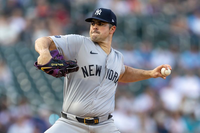 May 14, 2024; Minneapolis, Minnesota, USA; New York Yankees starting pitcher Carlos Rodón (55) pitches against the Minnesota Twins in the first inning at Target Field. Mandatory Credit: Jesse Johnson-USA TODAY Sports