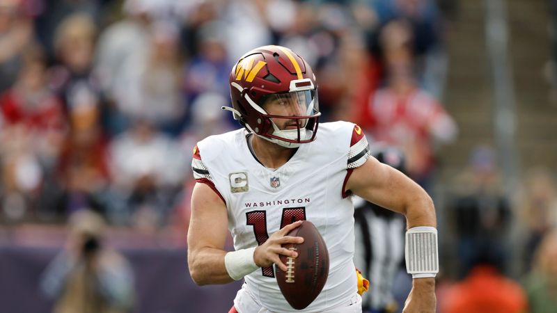 Washington Commanders quarterback Sam Howell plays against the New England Patriots during an NFL football game, Sunday, Nov. 5, 2023, in Foxborough, Mass. (AP Photo/Michael Dwyer)