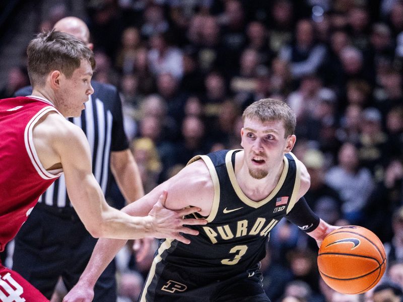 Feb 10, 2024; West Lafayette, Indiana, USA; Purdue Boilermakers guard Braden Smith (3) dribbles the ball while Indiana Hoosiers guard Gabe Cupps (2) defends in the second half at Mackey Arena. Mandatory Credit: Trevor Ruszkowski-USA TODAY Sports