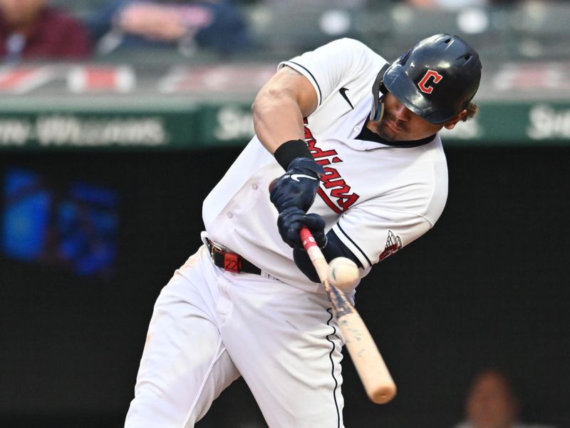 Jun 6, 2023; Cleveland, Ohio, USA; Cleveland Guardians first baseman Josh Naylor (22) hits a single during the fifth inning against the Boston Red Sox at Progressive Field. Mandatory Credit: Ken Blaze-USA TODAY Sports