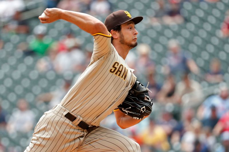 May 11, 2023; Minneapolis, Minnesota, USA; San Diego Padres starting pitcher Yu Darvish (11) throws to the Minnesota Twins in the second inning at Target Field. Mandatory Credit: Bruce Kluckhohn-USA TODAY Sports