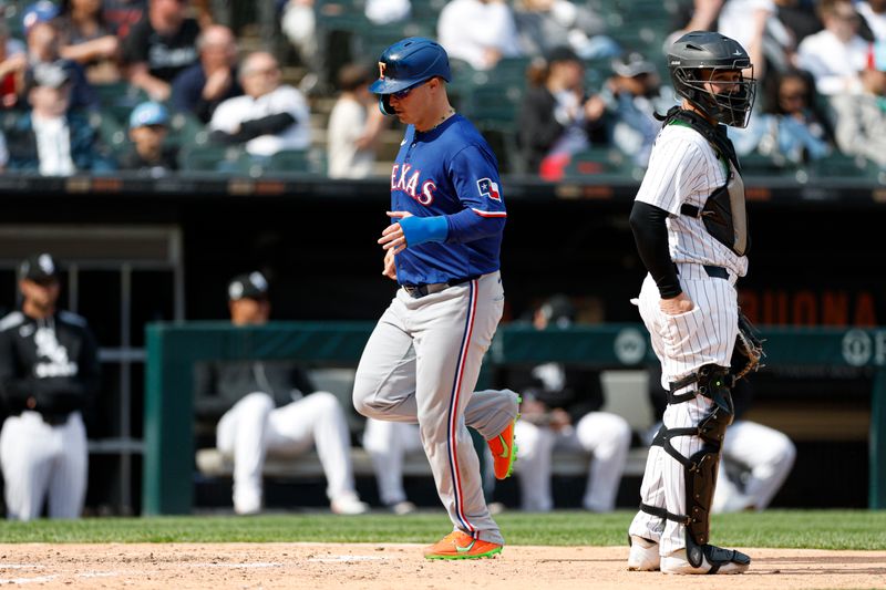 May 24, 2025; Chicago, Illinois, USA; Texas Rangers designated hitter Joc Pederson (4) scores against the Chicago White Sox during the fourth inning at Rate Field. Mandatory Credit: Kamil Krzaczynski-Imagn Images