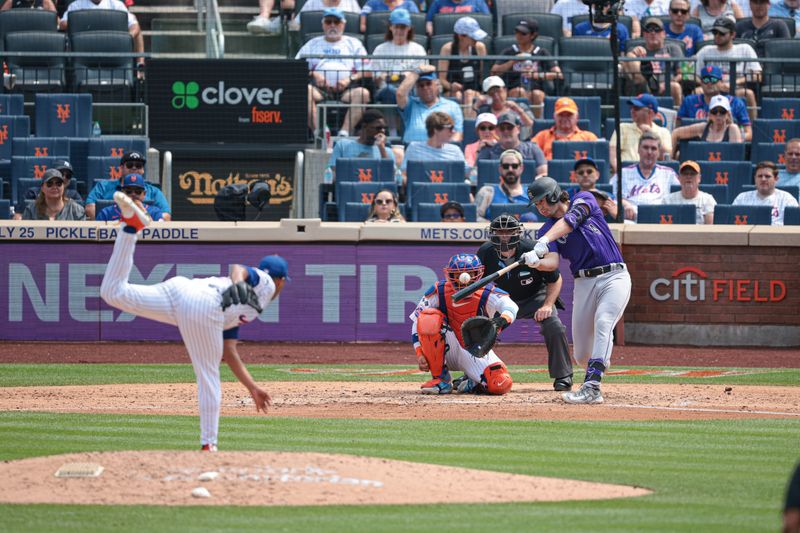 Jul 14, 2024; New York City, New York, USA;  Colorado Rockies first baseman Michael Toglia (4) hits a solo home run during the sixth inning against New York Mets starting pitcher Jose Quintana (62) at Citi Field. Mandatory Credit: Vincent Carchietta-USA TODAY Sports