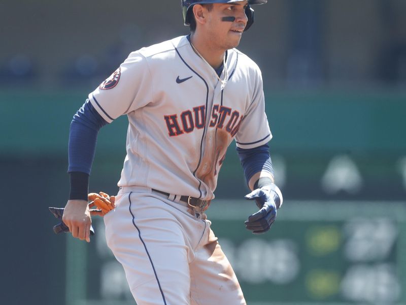 Apr 12, 2023; Pittsburgh, Pennsylvania, USA;  Houston Astros second baseman Mauricio Dubon (14) takes a lead off of second base against the Pittsburgh Pirates during the second inning at PNC Park. Mandatory Credit: Charles LeClaire-USA TODAY Sports