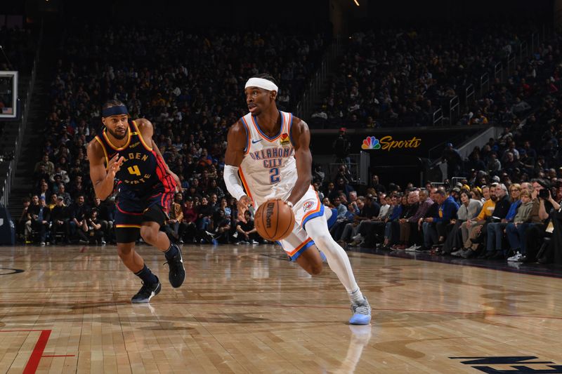 SAN FRANCISCO, CA - JANUARY 29: Shai Gilgeous-Alexander #2 of the Oklahoma City Thunder drives to the basket during the game against the Golden State Warriors on January 29, 2025 at Chase Center in San Francisco, California. NOTE TO USER: User expressly acknowledges and agrees that, by downloading and or using this photograph, user is consenting to the terms and conditions of Getty Images License Agreement. Mandatory Copyright Notice: Copyright 2025 NBAE (Photo by Noah Graham/NBAE via Getty Images)