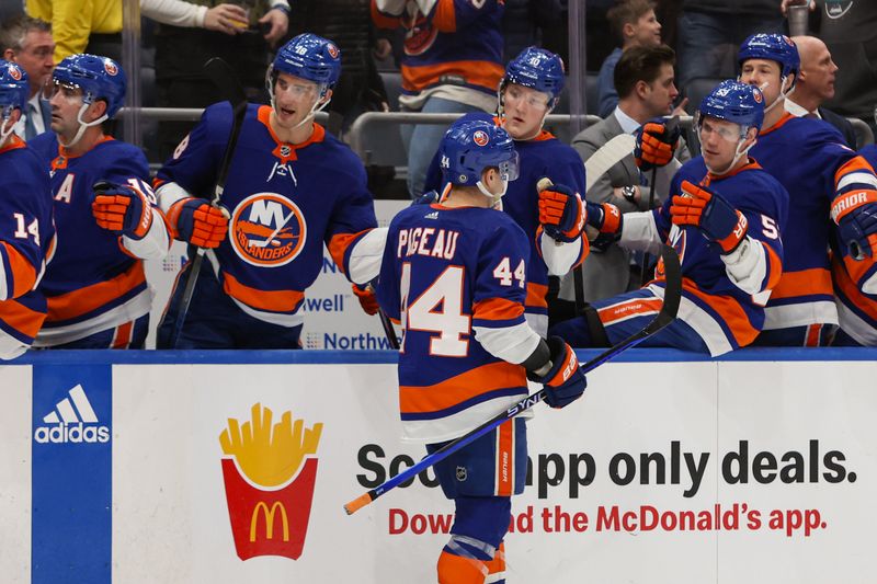 Mar 16, 2024; Elmont, New York, USA; New York Islanders center Jean-Gabriel Pageau (44) celebrates his goal against the Ottawa Senators during the second period at UBS Arena. Mandatory Credit: Thomas Salus-USA TODAY Sports