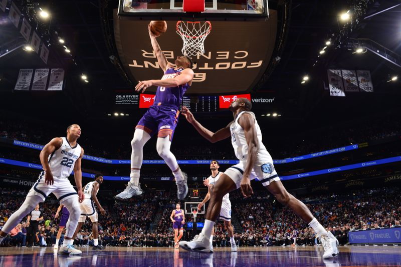 PHOENIX, AZ - JANUARY 7: Grayson Allen #8 of the Phoenix Suns shoots the ball during the game against the Memphis Grizzlies on January 7, 2024 at Footprint Center in Phoenix, Arizona. NOTE TO USER: User expressly acknowledges and agrees that, by downloading and or using this photograph, user is consenting to the terms and conditions of the Getty Images License Agreement. Mandatory Copyright Notice: Copyright 2024 NBAE (Photo by Barry Gossage/NBAE via Getty Images)