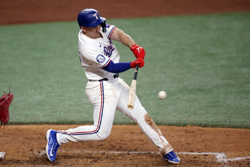 Jul 25, 2024; Arlington, Texas, USA; Texas Rangers left fielder Wyatt Langford (36) bats in the fifth inning against the Chicago White Sox at Globe Life Field. Mandatory Credit: Tim Heitman-USA TODAY Sports