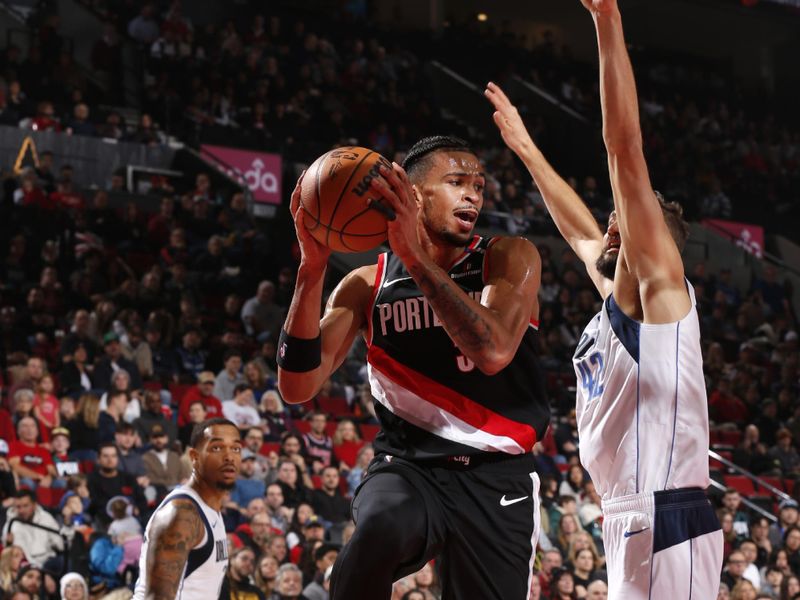 PORTLAND, OR - DECEMBER 1: Toumani Camara #33 of the Portland Trail Blazers handles the ball during the game against the Dallas Mavericks on December 1, 2024 at the Moda Center Arena in Portland, Oregon. NOTE TO USER: User expressly acknowledges and agrees that, by downloading and or using this photograph, user is consenting to the terms and conditions of the Getty Images License Agreement. Mandatory Copyright Notice: Copyright 2024 NBAE (Photo by Cameron Browne/NBAE via Getty Images)