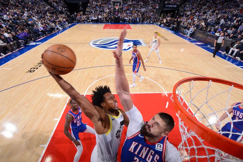 SACRAMENTO, CA - NOVEMBER 16: Collin Sexton #2 of the Utah Jazz drives to the basket during the game against the Sacramento Kings on November 16, 2024 at Golden 1 Center in Sacramento, California. NOTE TO USER: User expressly acknowledges and agrees that, by downloading and or using this Photograph, user is consenting to the terms and conditions of the Getty Images License Agreement. Mandatory Copyright Notice: Copyright 2024 NBAE (Photo by Rocky Widner/NBAE via Getty Images)