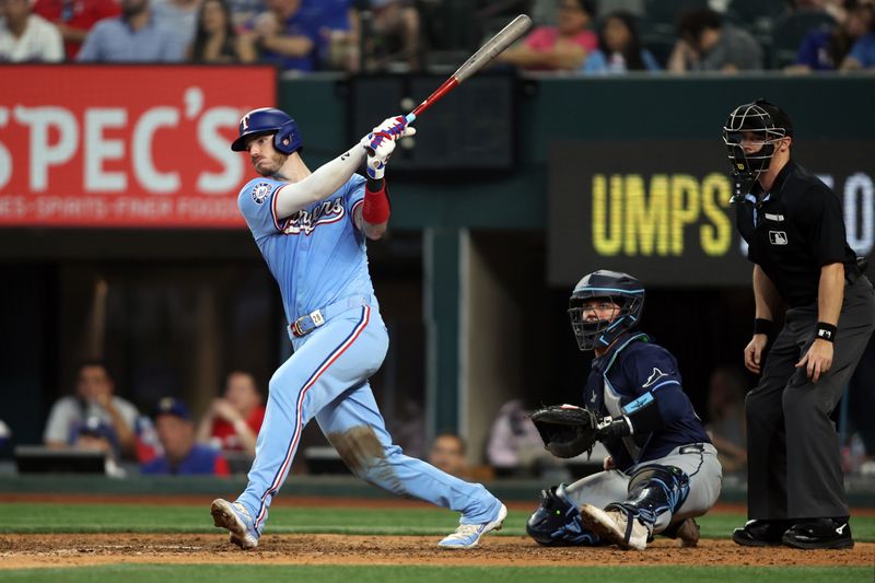 Jul 7, 2024; Arlington, Texas, USA; Texas Rangers catcher Jonah Heim (28) at bat in the eighth inning against the Tampa Bay Rays at Globe Life Field. Mandatory Credit: Tim Heitman-USA TODAY Sports
