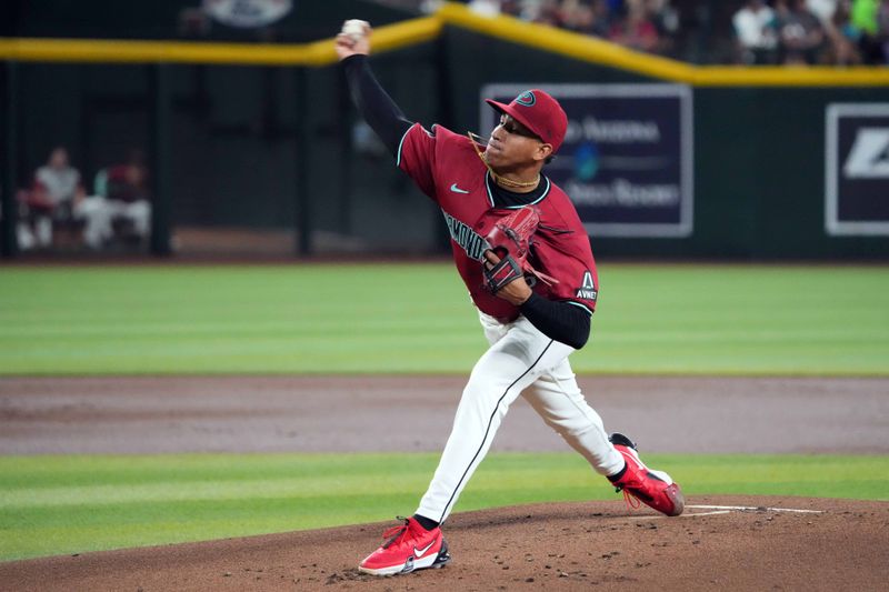 Jul 28, 2024; Phoenix, Arizona, USA; Arizona Diamondbacks pitcher Yilber Diaz (45) pitches against the Pittsburgh Pirates during the first inning at Chase Field. Mandatory Credit: Joe Camporeale-USA TODAY Sports