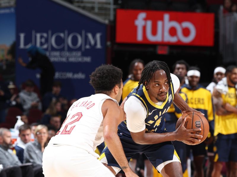 Cleveland, OH - OCTOBER 10: Tristen Newton #4 of the Indiana Pacers looks to pass the ball during the game against the Cleveland Cavaliers during a NBA pre season game on October 10, 2024 at Rocket Mortgage Fieldhouse in Cleveland, Ohio. NOTE TO USER: User expressly acknowledges and agrees that, by downloading and or using this photograph, User is consenting to the terms and conditions of the Getty Images License Agreement. Mandatory Copyright Notice: Copyright 2024 NBAE (Photo by Jeff Haynes/NBAE via Getty Images)