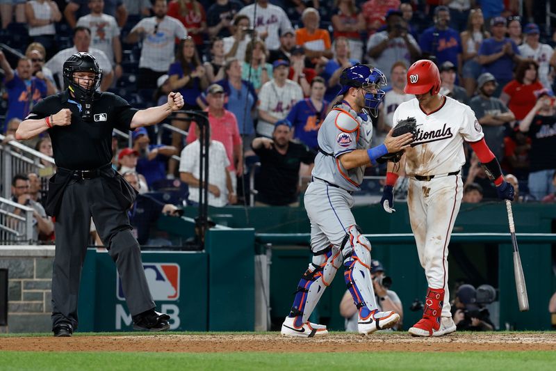 Jun 3, 2024; Washington, District of Columbia, USA; Washington Nationals catcher Drew Millas (81) walks off the field after being called out on strikes by home plate umpire umpire Carlos Torres (37) for the final out as New York Mets catcher Luis Torrens (13) celebrates at Nationals Park. Mandatory Credit: Geoff Burke-USA TODAY Sports