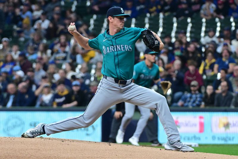 Apr 7, 2024; Milwaukee, Wisconsin, USA;  Seattle Mariners catcher Seby Zavala (33) throws a pith in the first inning against the Milwaukee Brewers at American Family Field. Mandatory Credit: Benny Sieu-USA TODAY Sports