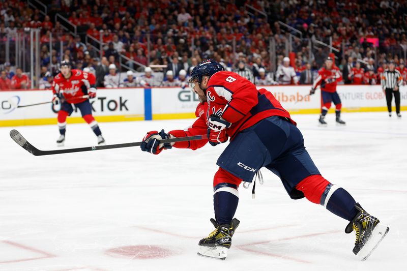 Oct 29, 2024; Washington, District of Columbia, USA; Washington Capitals left wing Alex Ovechkin (8) shoots the puck against the New York Rangers in the third period at Capital One Arena. Mandatory Credit: Geoff Burke-Imagn Images