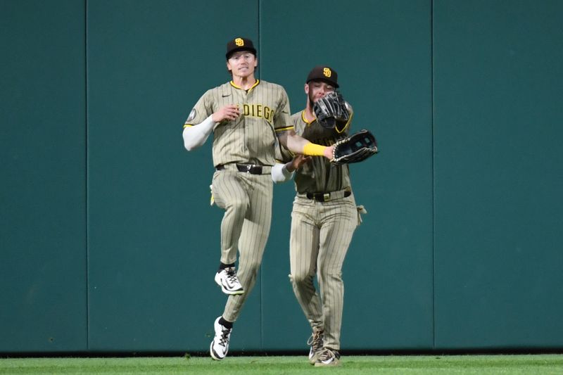 Jun 30, 2025; Philadelphia, Pennsylvania, USA; San Diego Padres outfielder Jackson Merrill (3) catches a fly ball and avoids outfielder Bryce Johnson (29) during the eighth inning against the Philadelphia Phillies at Citizens Bank Park. Mandatory Credit: Eric Hartline-Imagn Images